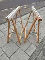 Schragen behangtafel, Ophalen