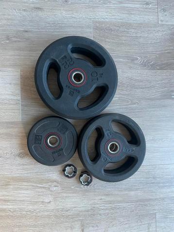 Corength Halterstang met gewichten (like new, dechatlon) beschikbaar voor biedingen