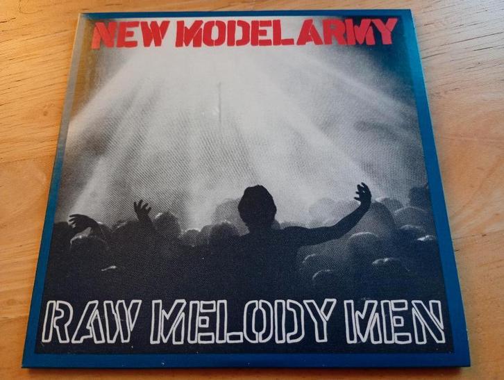 CD New Model Army - Raw Melody Men, Cd's en Dvd's, Cd's | Rock, Zo goed als nieuw, Alternative, Verzenden