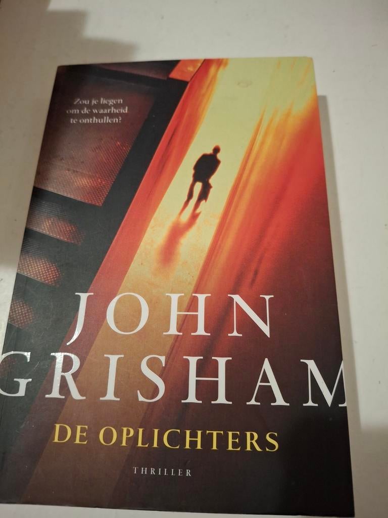 De Oplichters - John Grisham, Ophalen of Verzenden, Gelezen, John Grisham, Nederland