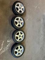 15 inch velgen 4x100 toyo t1r, Ophalen, 15 inch, 195 mm, Zomerbanden