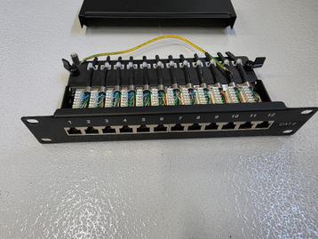 12-poorts patchpaneel 10 inch rackmount beschikbaar voor biedingen