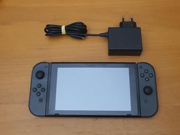 ZWARTE Nintendo Switch met Originele OPLADER beschikbaar voor biedingen