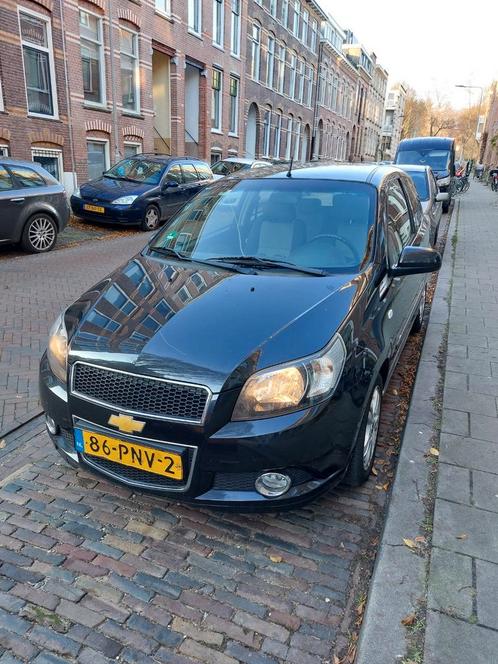 Chevrolet Aveo 1.2 16V 3D 2011 Zwart, Auto's, Chevrolet, Particulier, Aveo, Airconditioning, Elektrische ramen, Trekhaak, Benzine