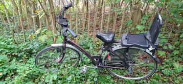 Batavus damesfiets met kinderzitje beschikbaar voor biedingen