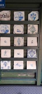 Ruim honderd antieke tegels, Ophalen