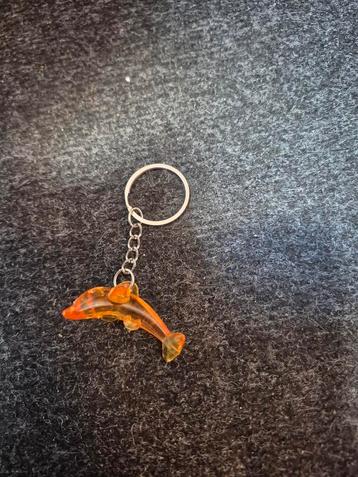 oranje dolfijn sleutelhanger  beschikbaar voor biedingen