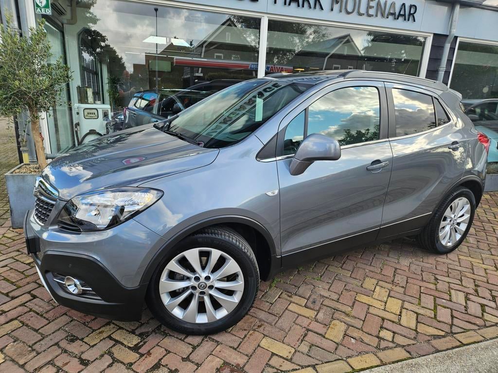 Opel Mokka 1.4 T Cosmo nederlandse auto!schuifkanteldak,lede, Auto's, Voorwielaandrijving, Euro 5, Gebruikt, 4 cilinders