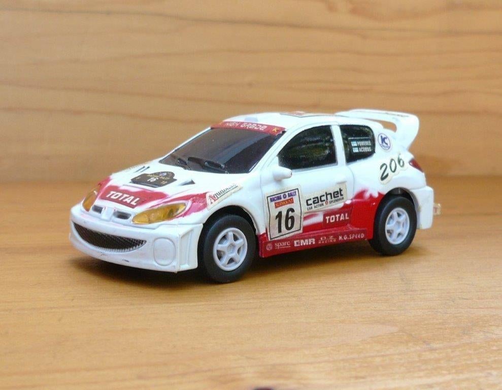 Peugeot 206 GTI cup rallywagen. 1/40., Hobby en Vrije tijd, Modelauto's | 1:43, Ophalen of Verzenden, Gebruikt, Auto, Overige merken