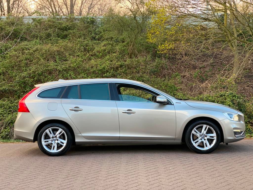 Volvo V60 2.4 D5 Twin Engine Special Edition AUT LEDER NAVI, Auto's, Volvo, Automaat, Euro 6, Bruin, 163 pk