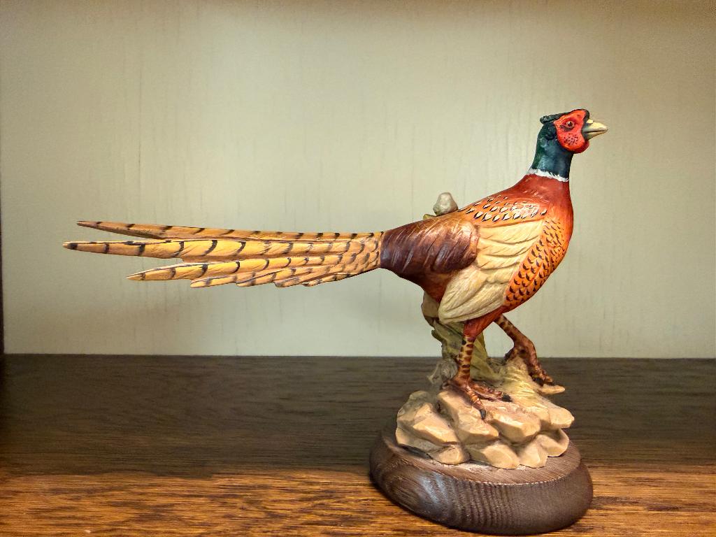 Verzameling houten en bronzen dieren cq wild, Ophalen