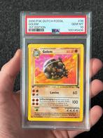 Pokémon - POP 3! - PSA 10 1st edition Golem Dutch #36 Fossil, Hobby en Vrije tijd, Verzamelkaartspellen | Pokémon, Ophalen of Verzenden