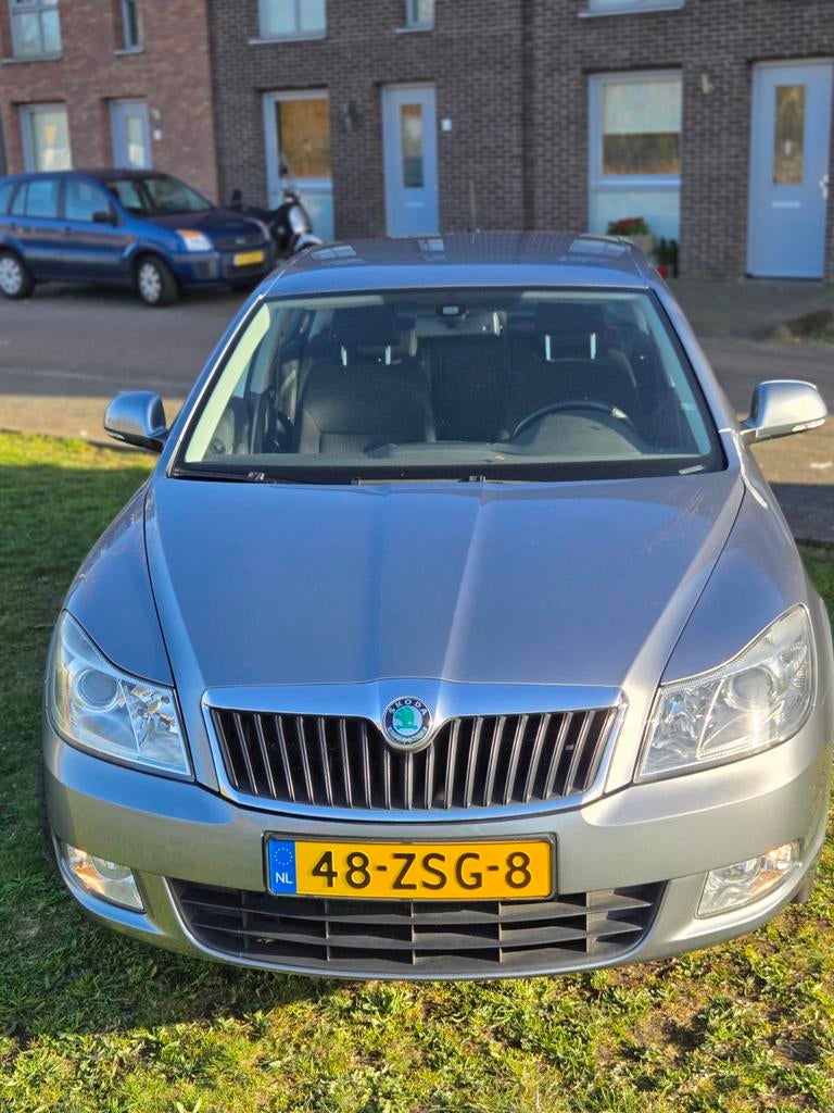 Skoda Octavia 1.2 TSI DSG 2013 Grijs, Auto's, Skoda, Stof, Zwart, 4 cilinders, Origineel Nederlands