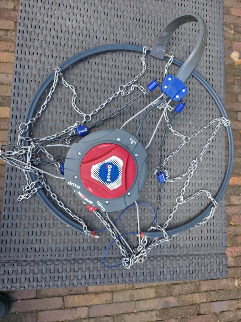 Pewag servo sneeuwkettingen, Ophalen