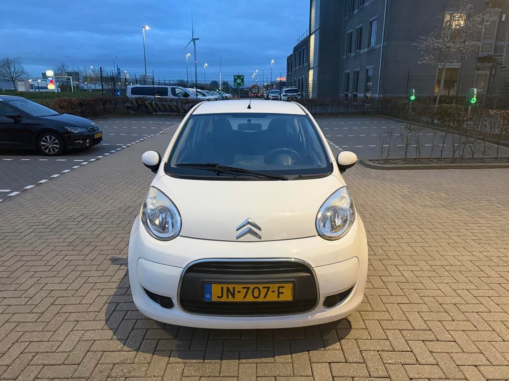 Citroën C1 1.0 3-DRS 2011 Wit, Auto's, Citroën, Voorwielaandrijving, Stof, Zwart, USB