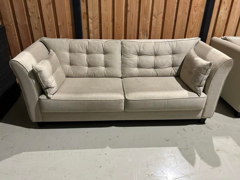 Crème 3-zitsbank van Woonhuis Elspeet, gereinigd