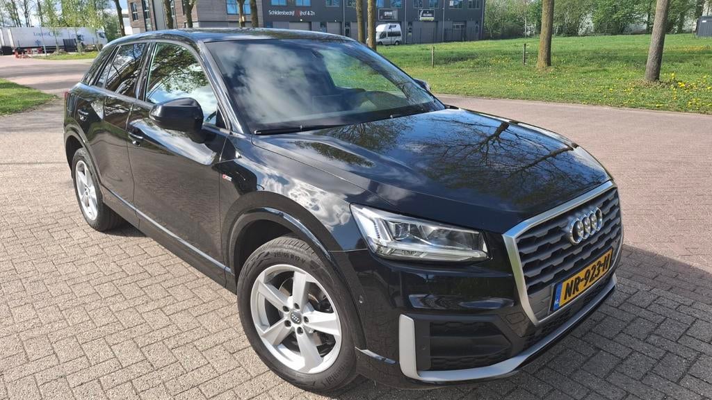 Audi Q2 1.6 TDI 116pk 2017 Zwart, Auto's, Voorwielaandrijving, 4 cilinders, Leder en Stof, Origineel Nederlands