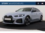 BMW i4 M50 / Schuif-kanteldak / Achteruitrijcamera / M Adapt, Auto's, 513 km, Gebruikt, Zwart, Met garantie (alle)