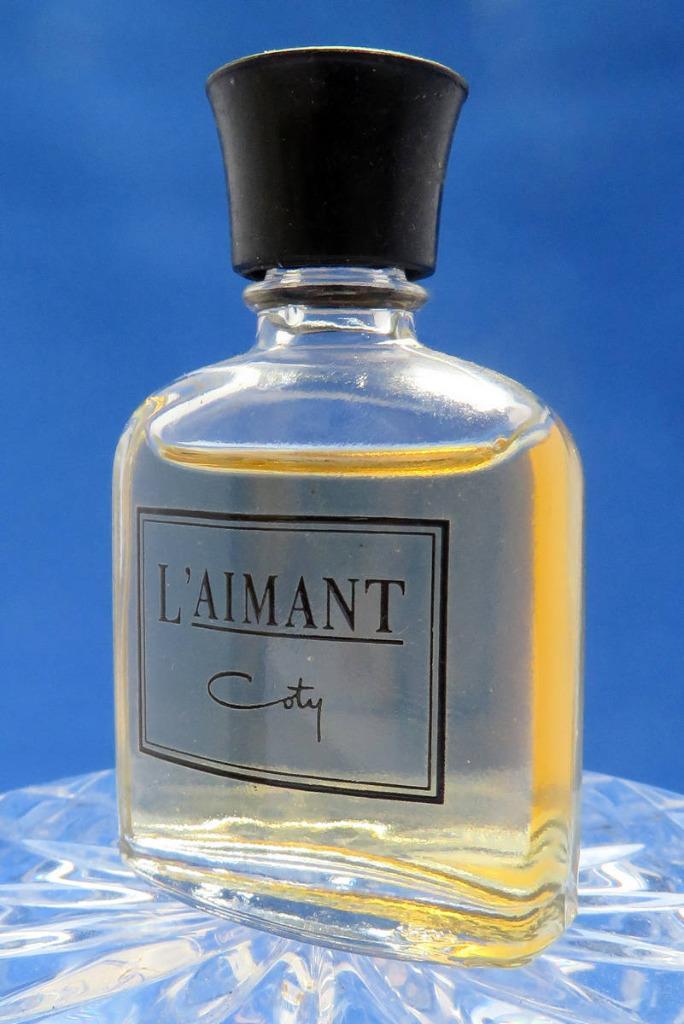 Mini - COTY - L'Aimant - 5ml - edt - 4,8cm - v3, Verzamelen, Parfumverzamelingen, Zo goed als nieuw, Miniatuur, Ophalen of Verzenden