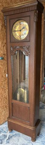 Staande wandklok met slinger en gewichten, Ophalen