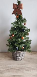 Een klein kerstboom met versiering., Ophalen of Verzenden, Gebruikt