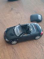 Audi TT 1e model zwart metallic, Hobby en Vrije tijd, Modelauto's | 1:18, Ophalen of Verzenden, Zo goed als nieuw