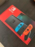 Nintendo Switch Neon Rood/Blauw – Compleet met doos, Ophalen, Zo goed als nieuw, Met 2 controllers, Switch OLED