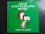 Snoopy; geluk is een warm jong hondje, Gelezen, Ophalen of Verzenden, Eén stripboek