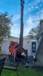 Grond en heiwerk, plaatsen stalen buispalen