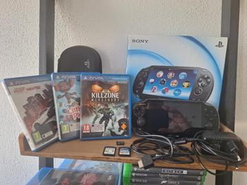 Ps vita met doos en games beschikbaar voor biedingen