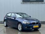 BMW 1-serie 116i High Executive, navi, stoelverwarming, crui, Auto's, BMW, Euro 5, Gebruikt, 4 cilinders, Blauw