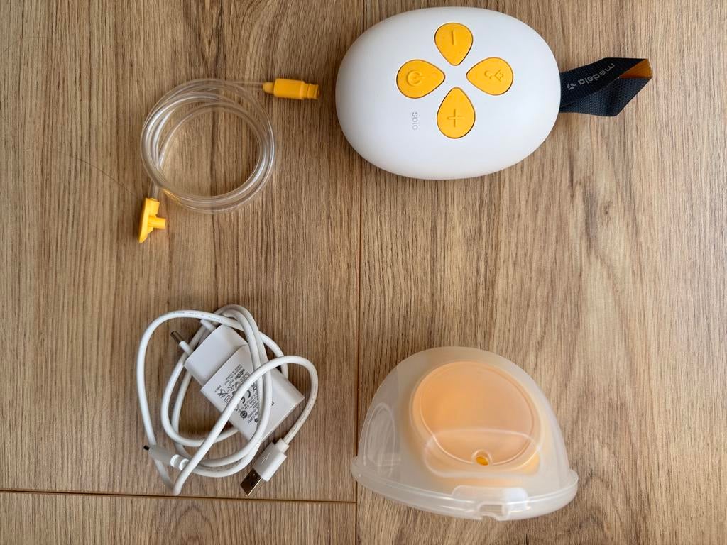 Medela Solo Hands-free Borstkolf - Nieuwstaat, Ophalen of Verzenden, Zo goed als nieuw, Borstkolf