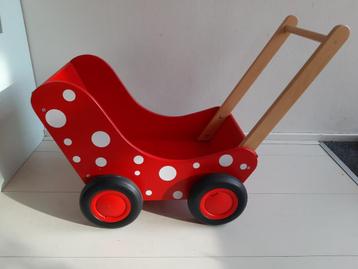 houten rode poppenwagen beschikbaar voor biedingen