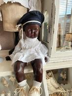 Een antiek sleets donker popje, Ophalen of Verzenden, Gebruikt, Pop