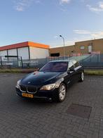 BMW 7-Serie 4.4 I 750 AUT 2011 Zwart, Auto's, Automaat, 2005 kg, 4395 cc, Zwart