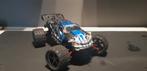TRAXXAS E-REVO 1/16 RC + 2 extra bandensets, extra ondelen, Elektro, Gebruikt, Auto offroad, Ophalen of Verzenden