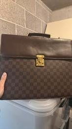LV laptoptas, Ophalen