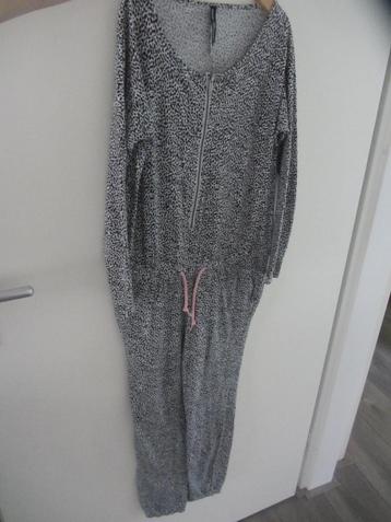 Zwart/witte jumpsuit XXS +- maat 128-134 beschikbaar voor biedingen