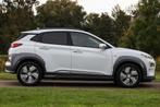 Hyundai Kona EV Premium 64 kWh ✅ Warmtepomp ✅ Leder ✅, Gebruikt, Wit, Adaptive Cruise Control, 204 pk