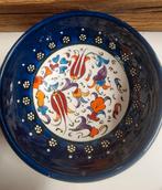 Handgemaakte decoratieve schaal, Ophalen