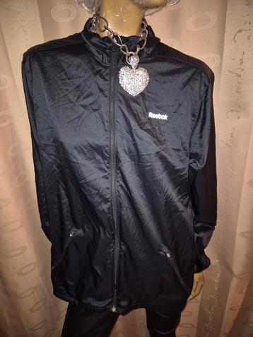 Prachtige sport jasje van Reebok maat 40 zwart  beschikbaar voor biedingen