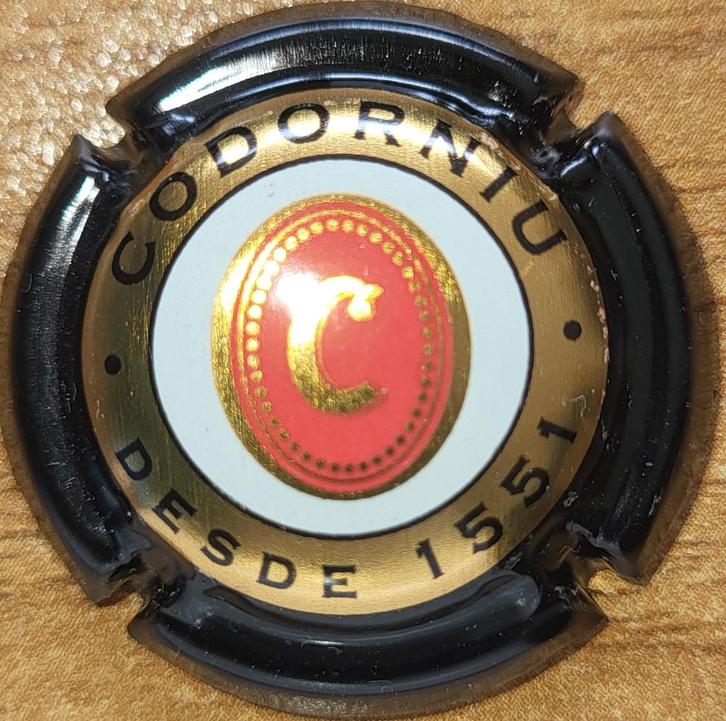 Spaanse Cavacapsule CODORNIU zwart & licht koper nr. 24, Verzamelen, Wijnen, Nieuw, Overige typen, Spanje, Ophalen of Verzenden