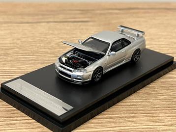 Nissan Skyline GT-R R34 V Spc II Sparkling Silver motorhelix beschikbaar voor biedingen