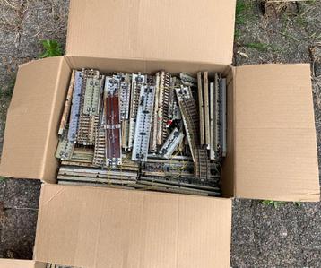 2 dozen met marklin rails beschikbaar voor biedingen