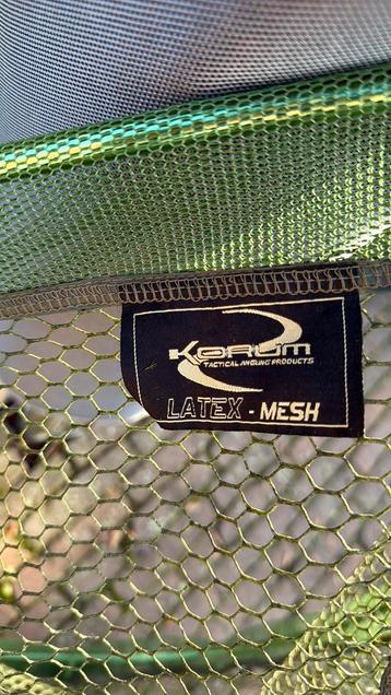 Groot Korum latex gecoat schepnet voor steel beschikbaar voor biedingen