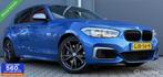 BMW 1-serie M140i xDrive LCI2 Edition Shadow Executive Navi+, Auto's, BMW, Gebruikt, Euro 6, Blauw, 340 pk