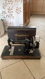 Antieke hand naaimachine Naumann, Ophalen