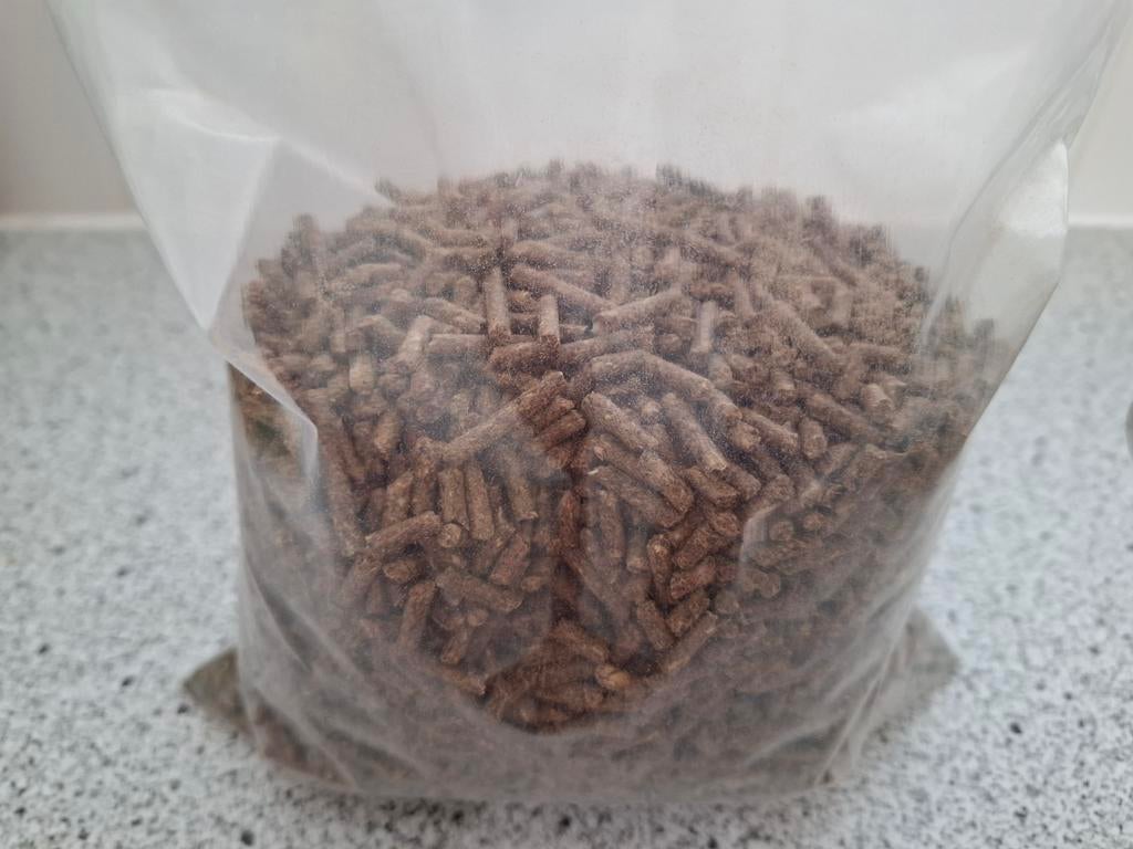 Gratis restje konijnenkorrels., Ophalen