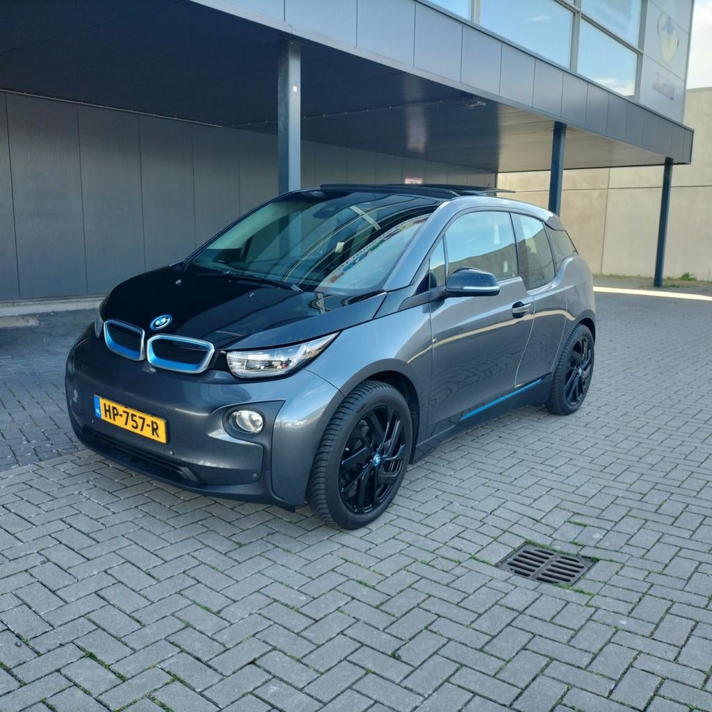 BMW i3 FEV 2015 Grijs 76. 000km Full options, Auto's, BMW, Particulier, i3, ABS, Achteruitrijcamera, Adaptieve lichten, Adaptive Cruise Control