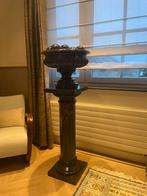 Marmeren zuil met ballen, Ophalen